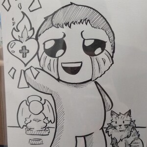 May include: Black and white ink drawing of a cartoon character with large eyes and tears, holding a flaming heart with a cross. An angel statue and a cat are also depicted. The character is smiling. The drawing style is simple.