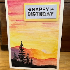 Cartão de aniversário feito à mão - pôr do sol em aquarela