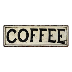 May include: A vintage-style metal sign with a white background and black lettering that reads "COFFEE". The sign has a distressed, rusty look.
