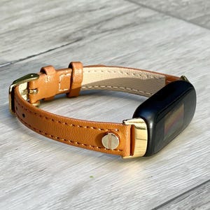 Light Brown Leather Fitbit Inspire 3 Band: Slim Strap with Gold Accents, Adjustable Bracelet