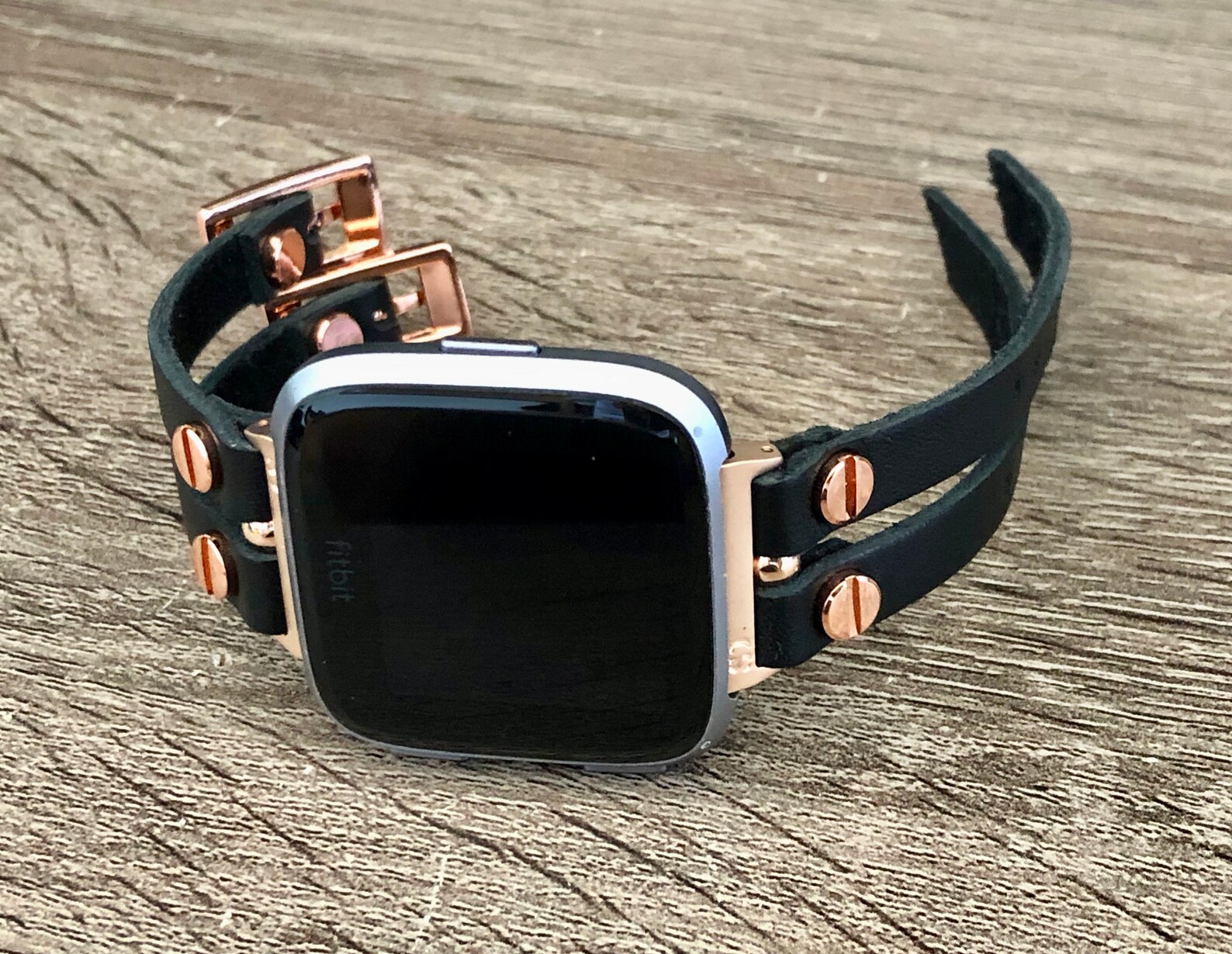 versa rose gold with black band