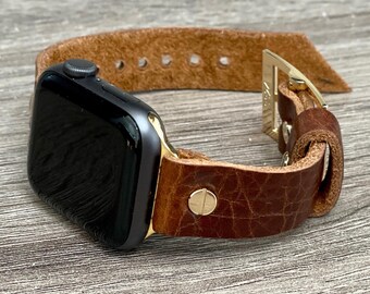 Correa de cuero granulado marrón para Apple Watch: Pulsera con detalles dorados