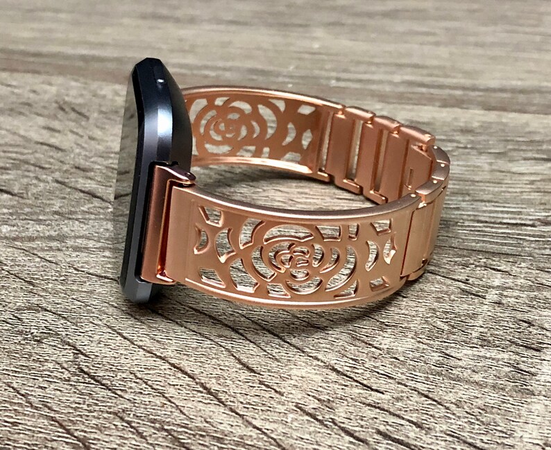 fitbit versa rose gold with black band