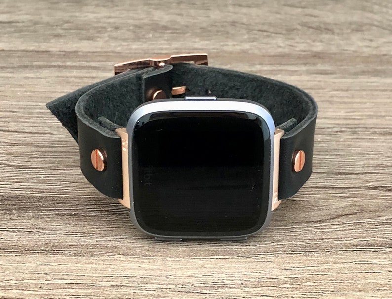 versa rose gold with black band