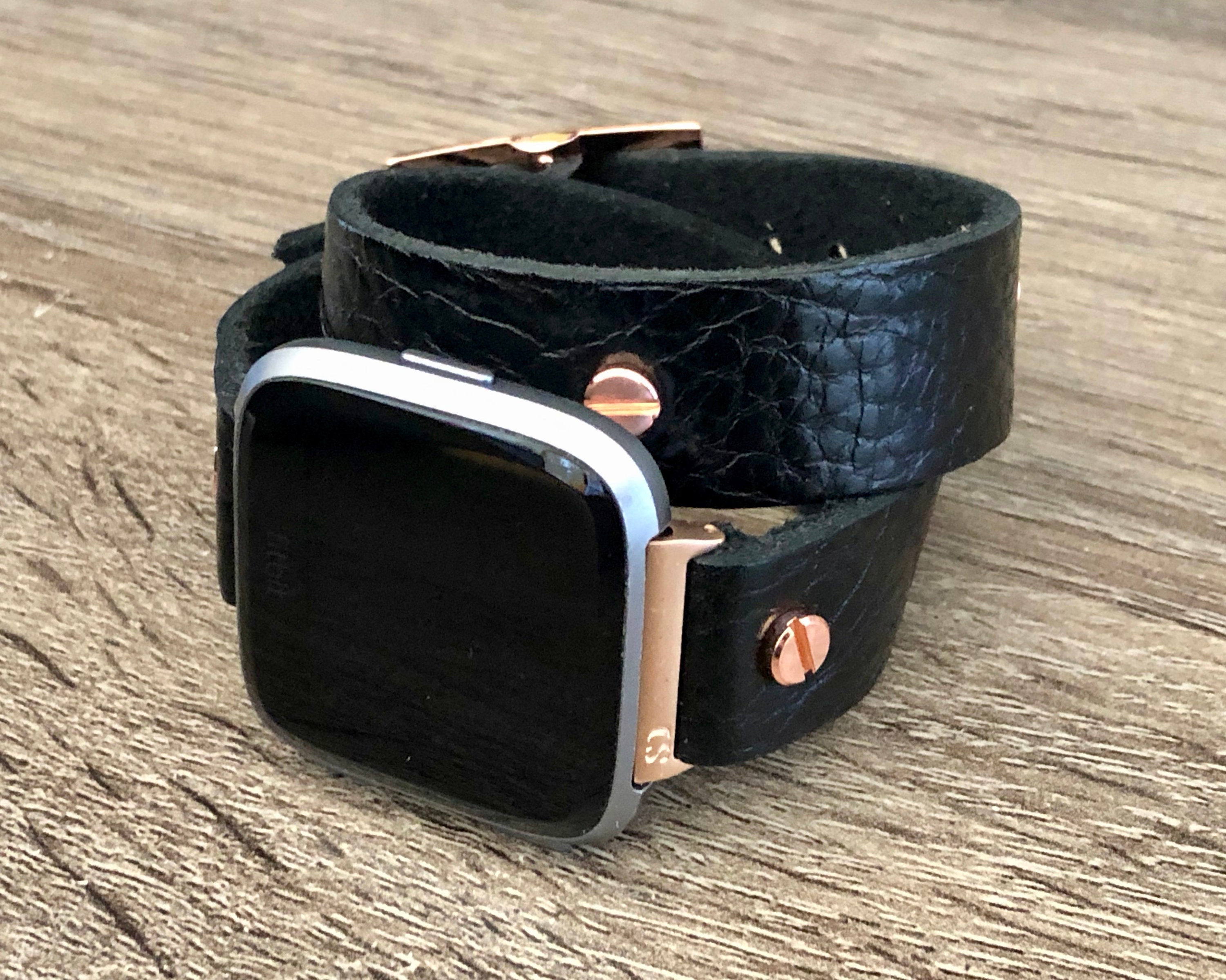 fitbit versa rose gold with black strap