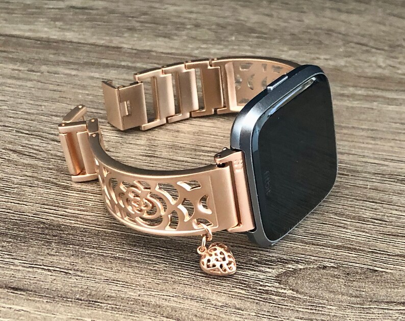 fitbit versa rose gold with black strap