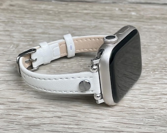 Pulseira fina de couro branco para Apple Watch, feminina, ajustável, dourada ou prateada.