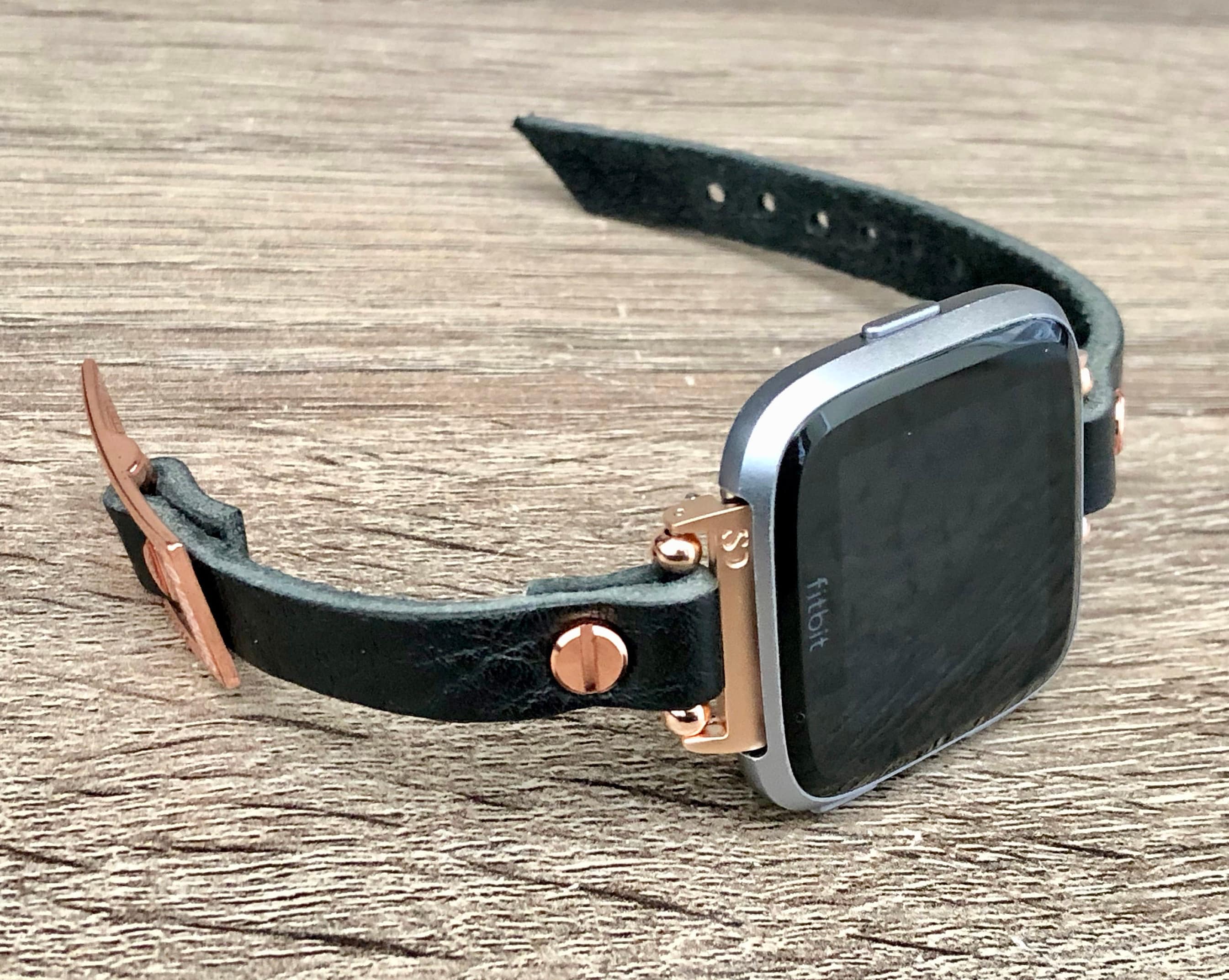 versa rose gold with black band