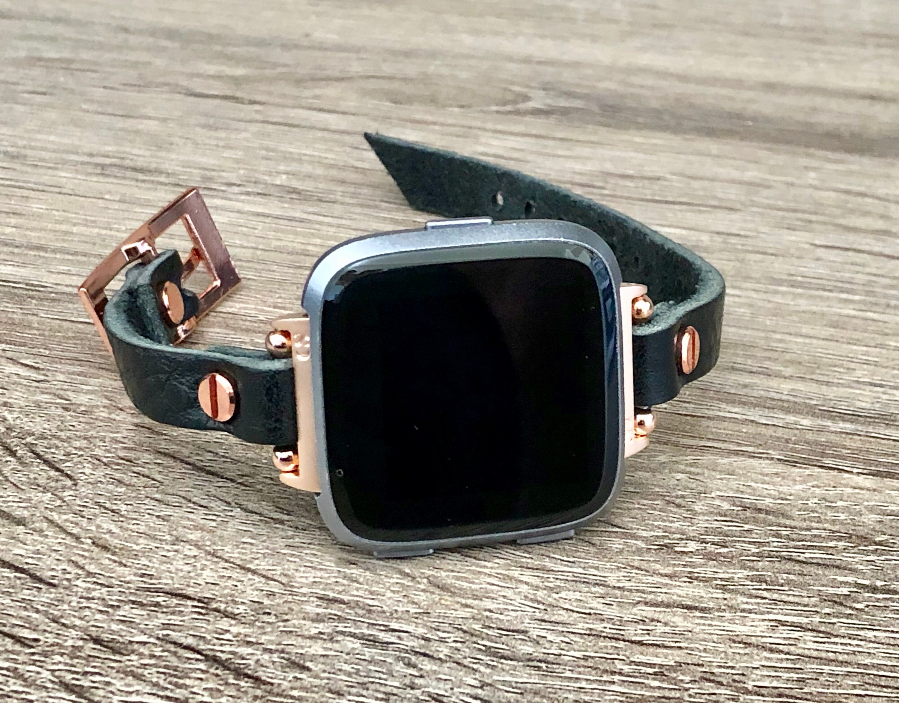 black and rose gold fitbit versa