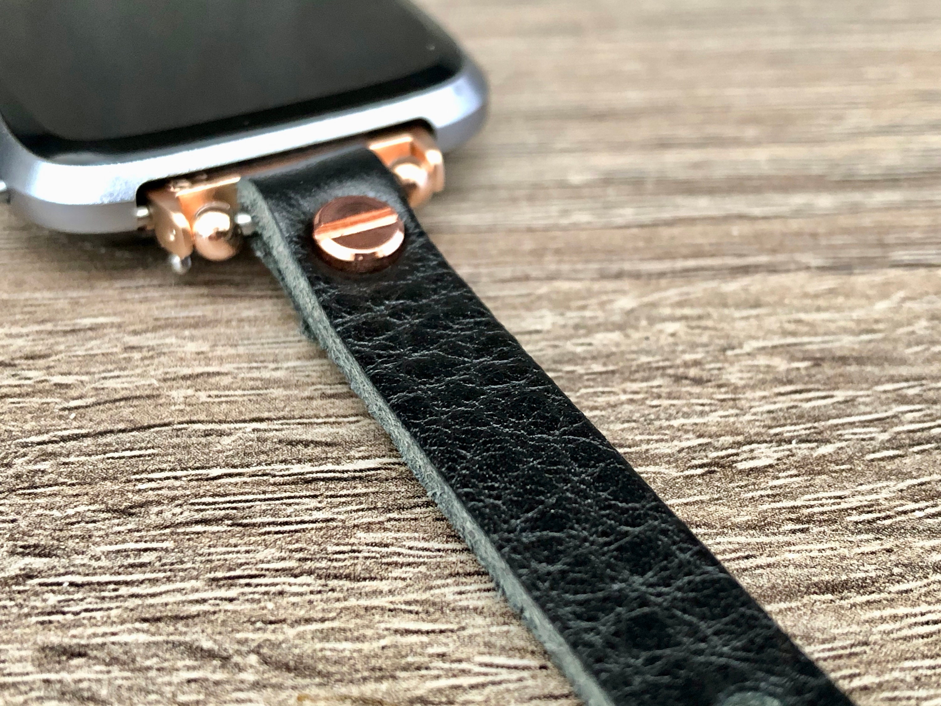 black and rose gold fitbit versa