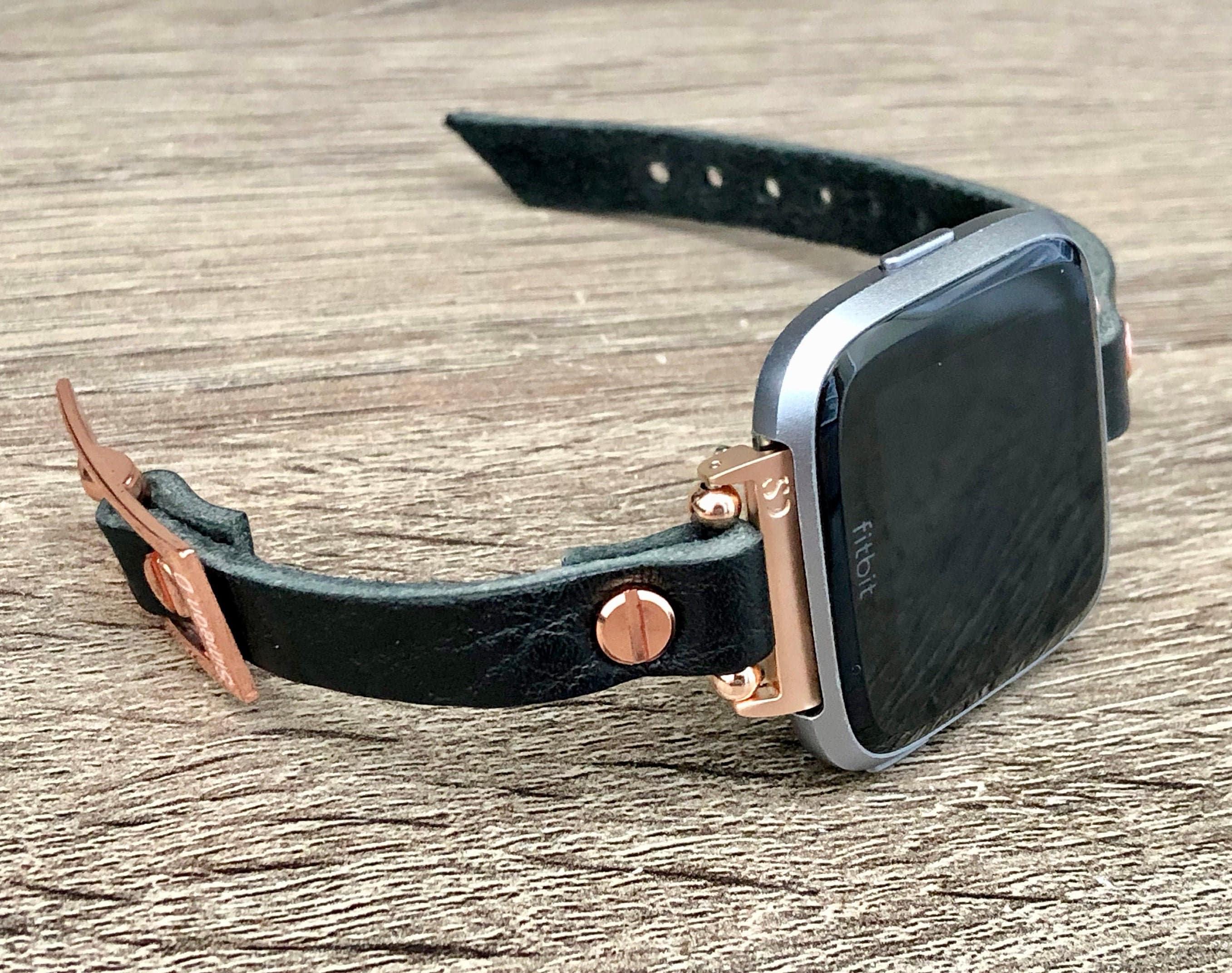 versa rose gold with black band