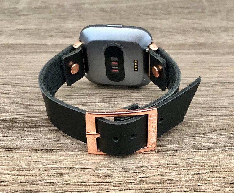 fitbit versa rose gold with black band