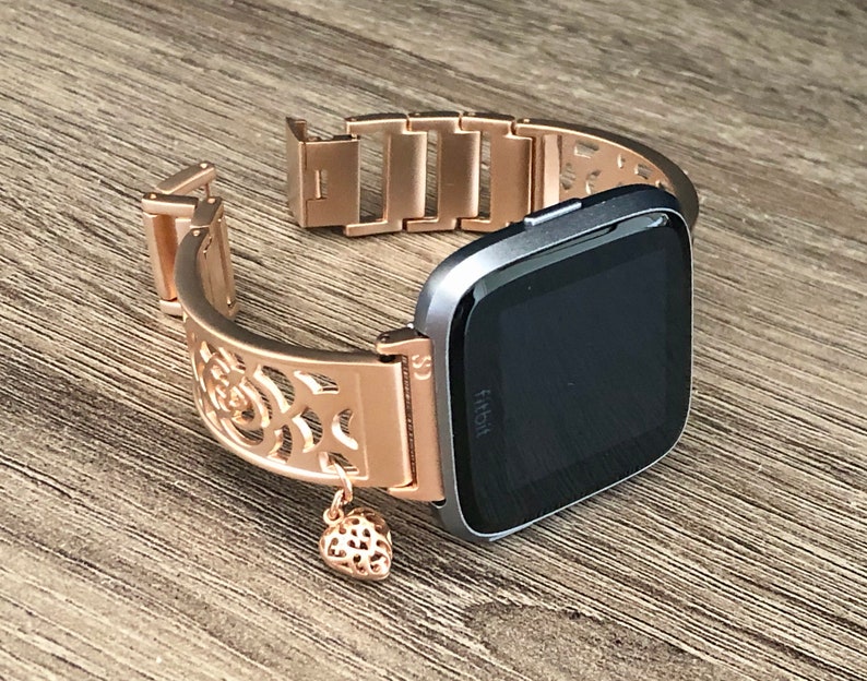 fitbit versa rose gold with black strap