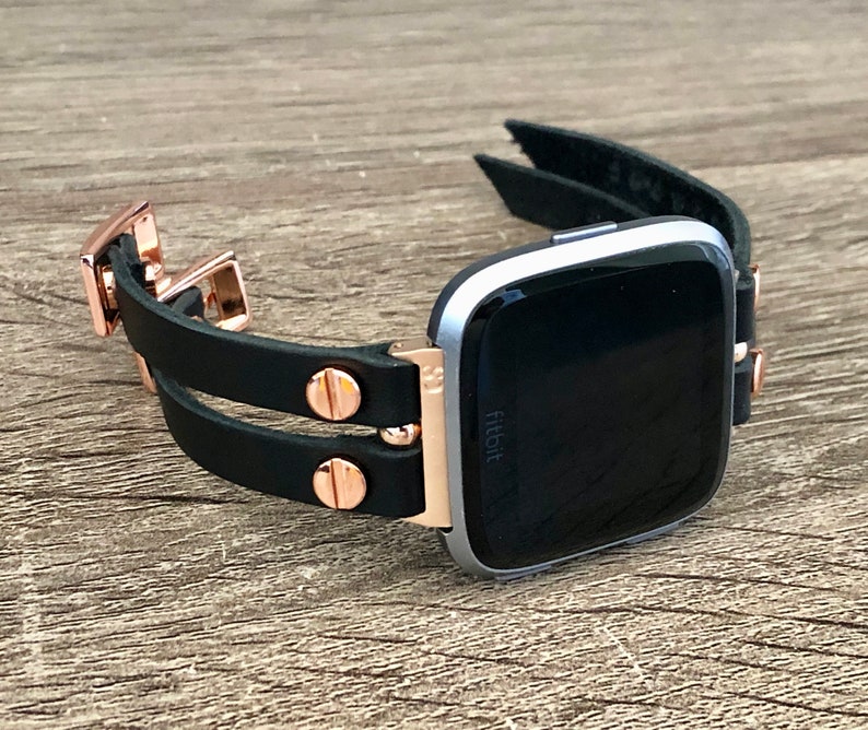 versa rose gold with black band