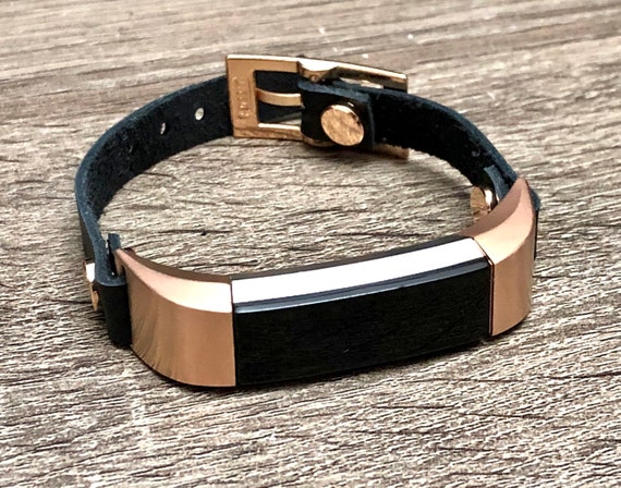 rose gold fitbit with black band