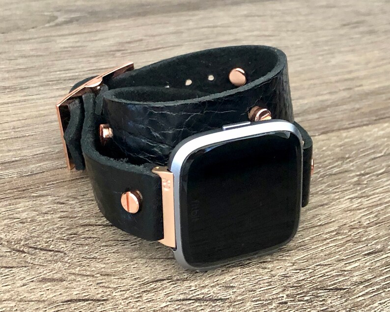 versa rose gold with black band
