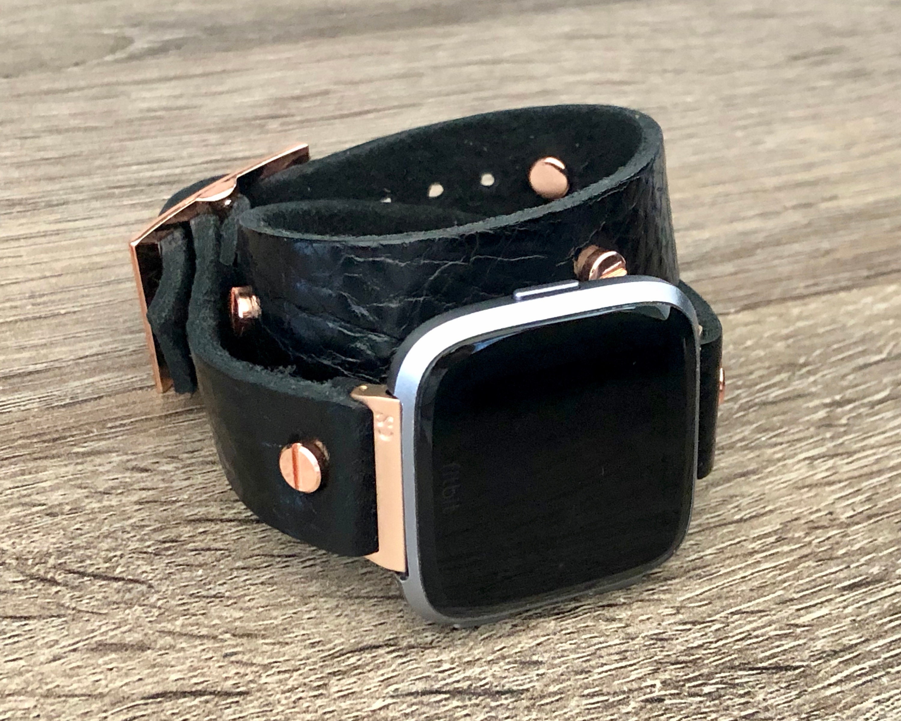 versa rose gold with black band
