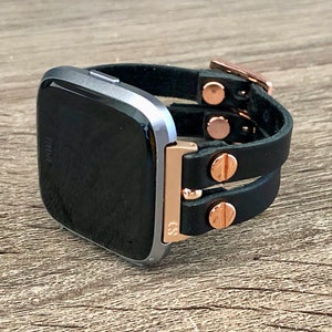 black and rose gold fitbit versa