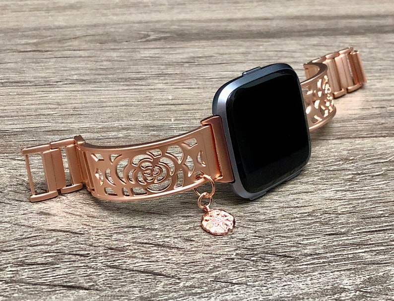fitbit versa rose gold with black band