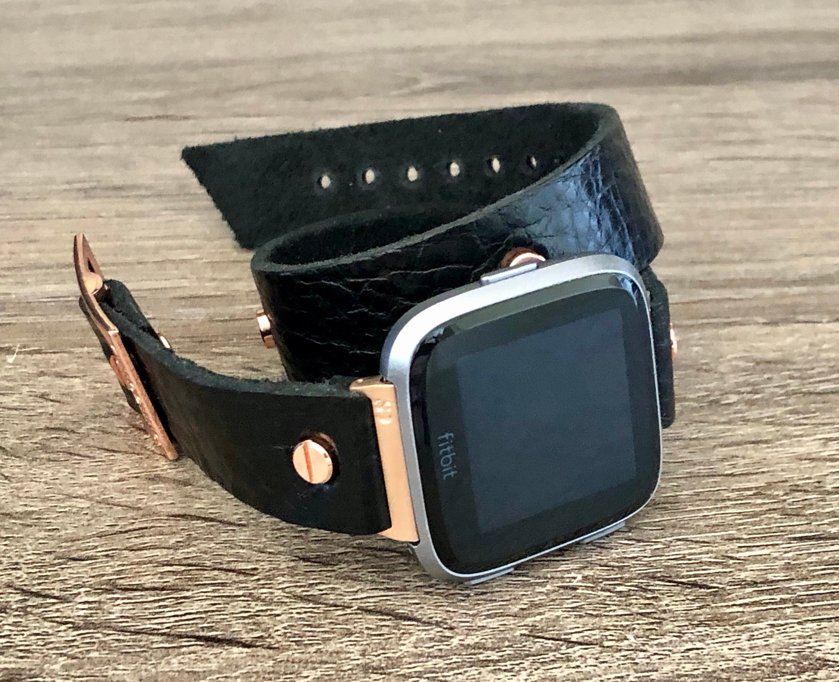 versa rose gold with black band