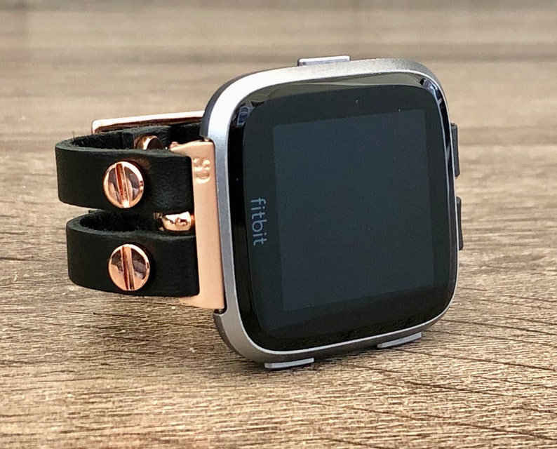 versa rose gold with black band
