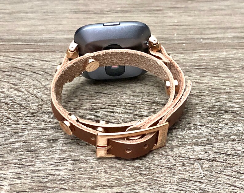 ruby rose gold fitbit versa