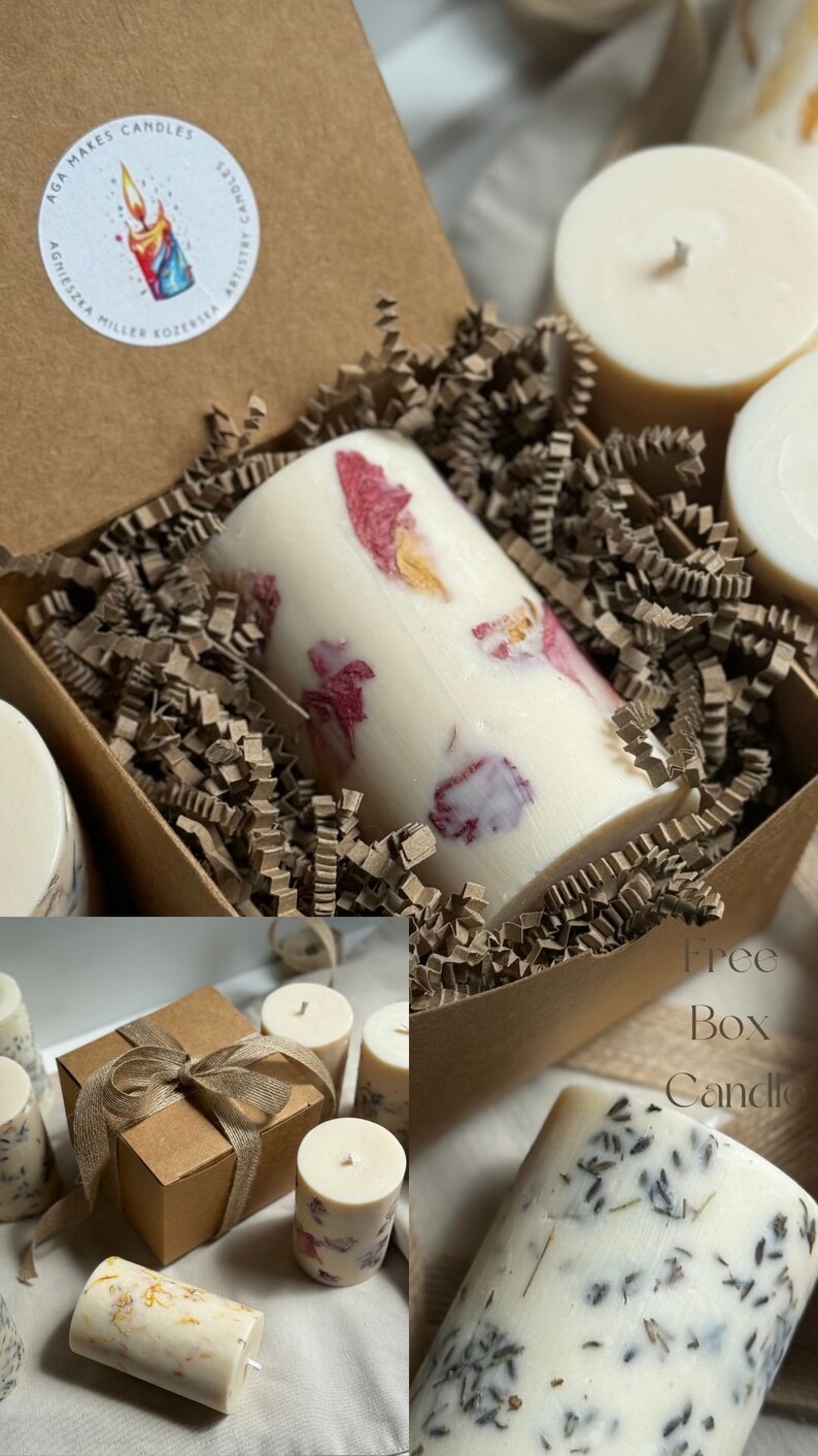 May include: A set of four candles in a brown box with a label that says "Aga Makes Candles". The candles are white and have different floral designs. The box is filled with brown packing paper. There is a free box candle with a lavender design.