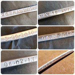 May include: Close-up of four metal bars with different dates engraved on them. The dates are 5.29.2010, 06.02.2012, 06.02.2013, and 25th MAY 2020. The last bar has the words "FOREVER AND ALWAYS" engraved on it.