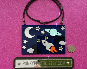 Acrylic outer space. Moon, star's, rocket and Saturn necklace