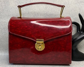 red patent leather pocketbook