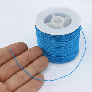 Cordón para anudar de 100 m/110 yardas y 0,6 mm - Cordón para abalorios azul - Cordón de nailon - Macramé Shamballa - Cordón para anudar chino - Suministros de joyería - CNM09