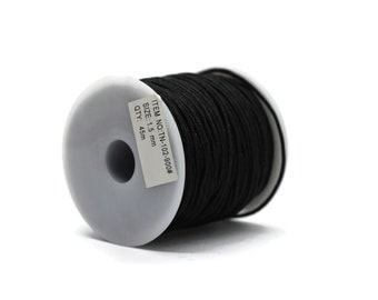 May include: A spool of black elastic cord, 1.5 mm in size, with a label that reads "ITEM NO:TN-102-900# SIZE: 1.5 mm OTY: 45m"