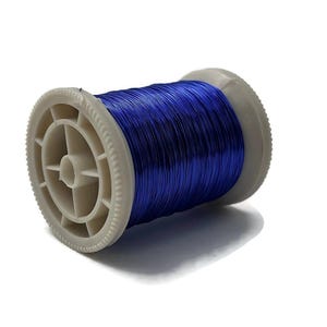 May include: A spool of vibrant blue wire, tightly wound around a white plastic core. The wire has a metallic sheen, reflecting light. The spool is set against a clean white background, highlighting the color and texture of the wire.