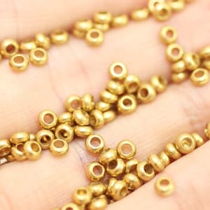 Raw Brass Spacer Beads  2x4mm hole 1,5 mm, connector rings, Round Spacers, Spacer Rings, Tiny Spacer Beads, rondelle beads, 4mm rings