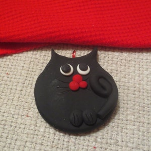 Black cat Christmas ornament clay cat red scarf white dots