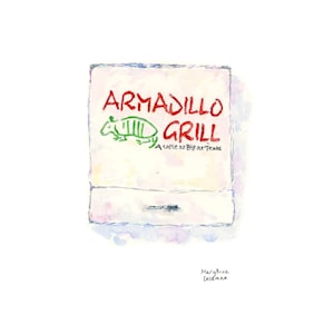 May include: A watercolor illustration of a sign for a restaurant called "Armadillo Grill." The sign is white with red lettering and a green armadillo illustration. The text below the restaurant name reads "A taste as Big as Texas."