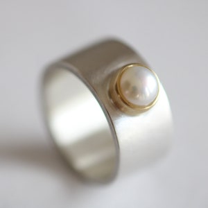 Unique ring in silver with a white pearl set in 22kt gold by Frank Schwope, pearl, gold, silver, unique, ring, Schwope, unique jewellery