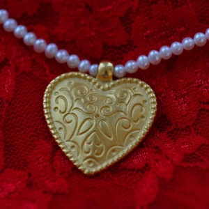 Heart pendant in solid silver 22kt gold plated by Frank Schwope