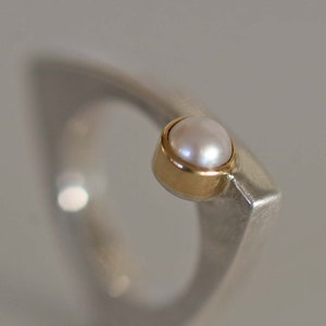 Unique ring made of sterling silver with pearl set in gold by Frank Schwope, pearl, gold, white, ring