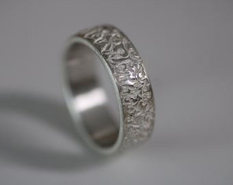 Ring with surrounding hallmarked ornaments by Frank Schwope, wedding ring, ring, silver, wedding, unique, goldsmith's craft, marriage, partner