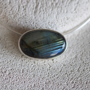 Pendant in solid silver with oval labradorite by Frank Schwope, blue, sky, labradorite, precious stone, gold work, necklace