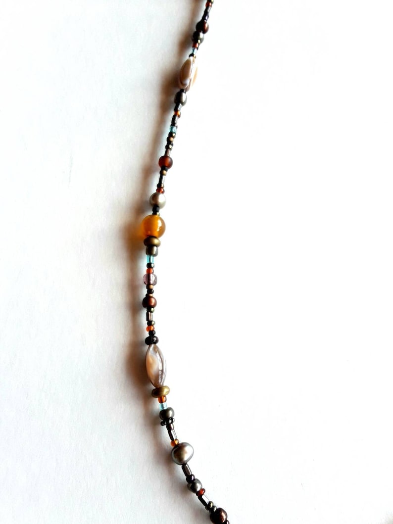 Bohemian Glass And Semiprecious Stone Beaded Necklace With Mother Pearl Cut Flaming Sun Pendant And Key Clasp Charm