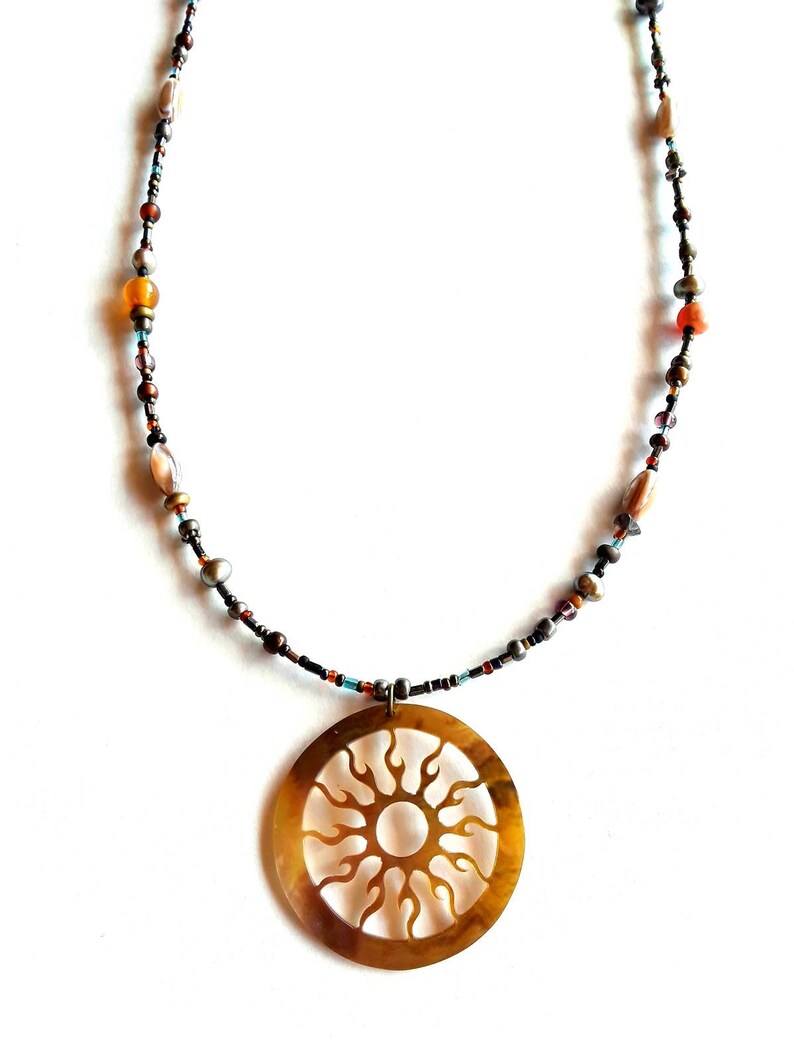 Bohemian Glass And Semiprecious Stone Beaded Necklace With Mother Pearl Cut Flaming Sun Pendant And Key Clasp Charm