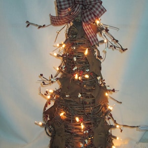 LIGHTED CONE TREE with burgundy and cream berries plus stars and bow