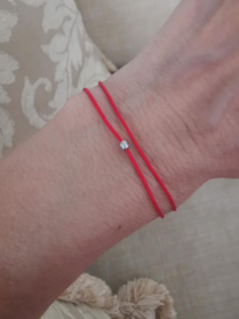 The Red string of fate bracelet.