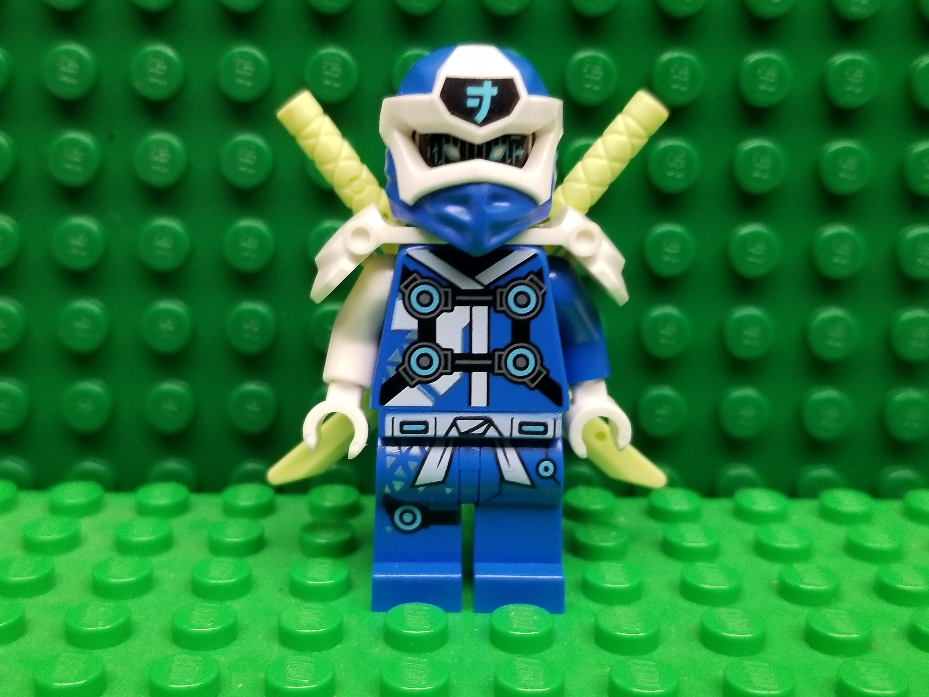 LEGO Ninjago: Lloyd Garmadon (Green Ninja) Minifigure with Shoulder Armor  and Two katanas (Swords)