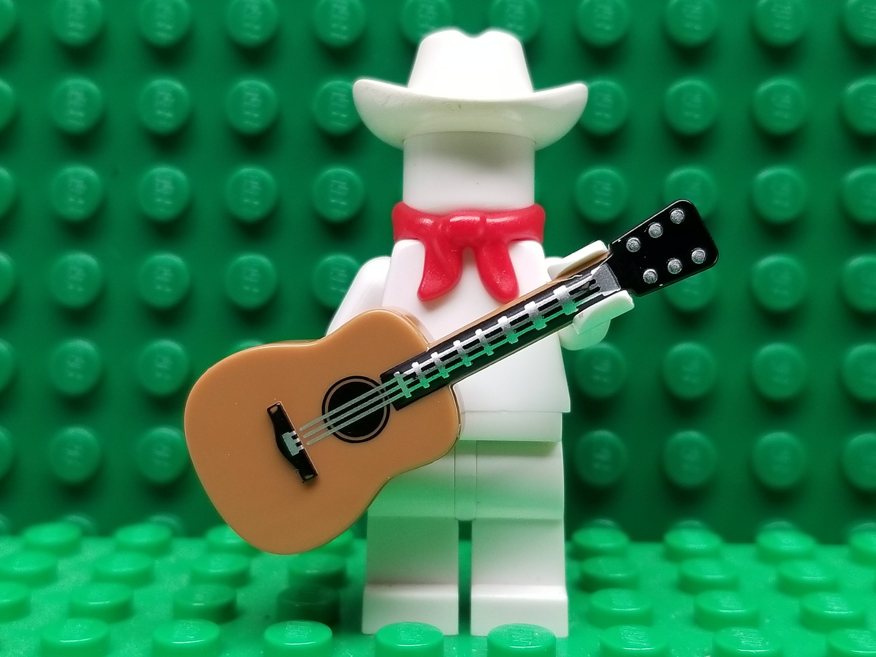 Guitar made of LEGO skillfully played by fifth grader