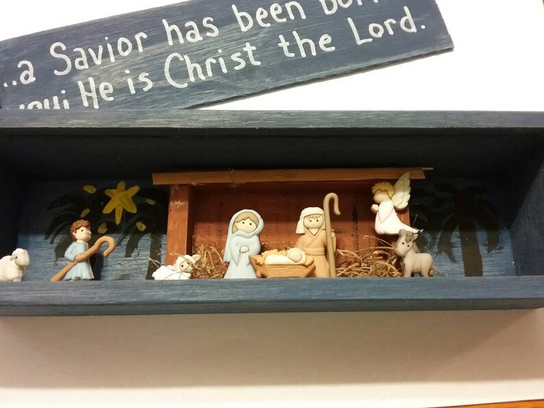 With wooden Manger and painted scene ...a Savior has been born to you; He is Christ the Lord Nativity scene slide top shadow box