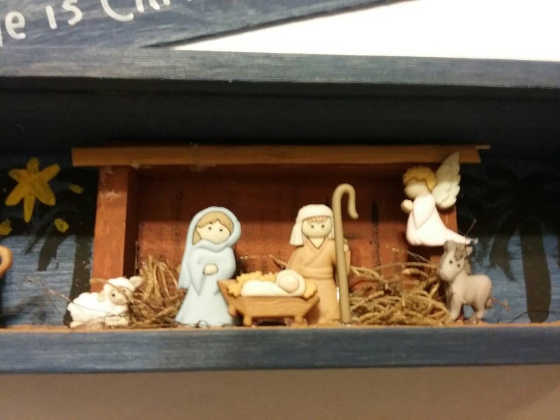 With wooden Manger and painted scene ...a Savior has been born to you; He is Christ the Lord Nativity scene slide top shadow box