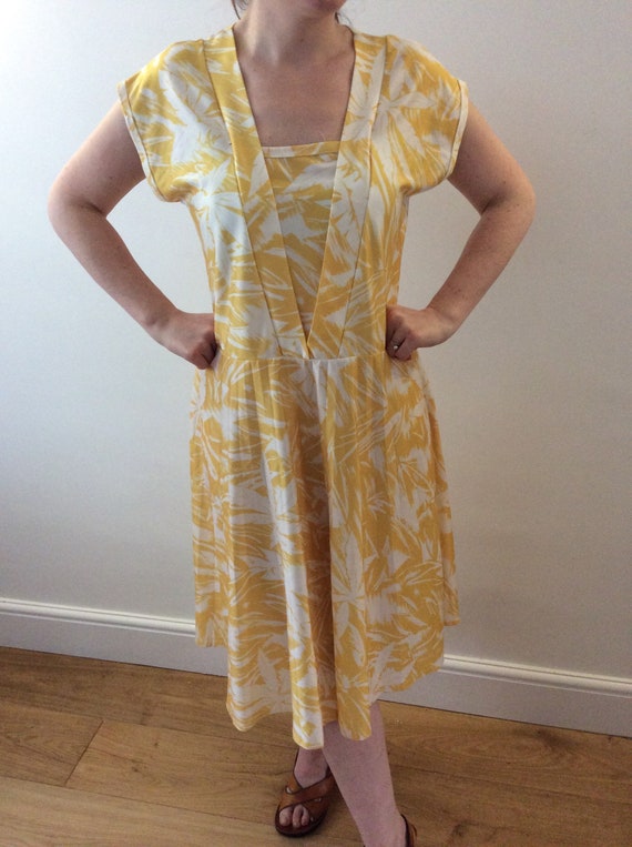 yellow patterned dress